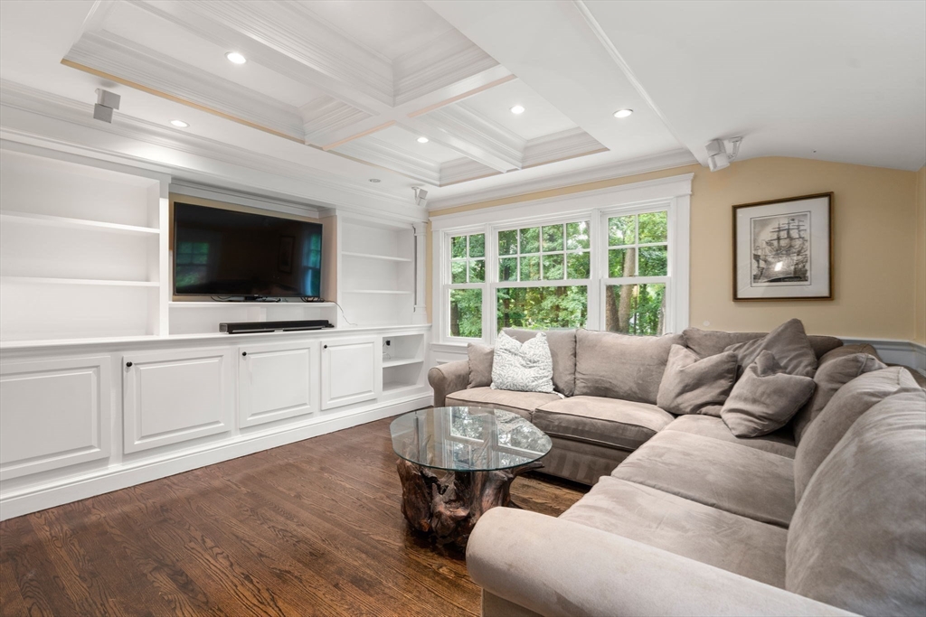 14 Sunset Road Wellesley, MA 02482 - Photo 15 of 39 a living room with furniture and a flat screen tv