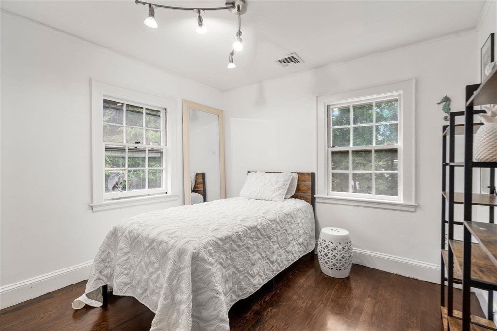 14 Sunset Road Wellesley, MA 02482 - Photo 22 of 39 a bedroom with a bed and a window