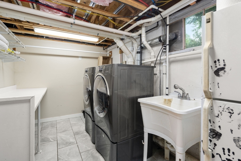 14 Sunset Road Wellesley, MA 02482 - Photo 29 of 39 a utility room with dryer and washer