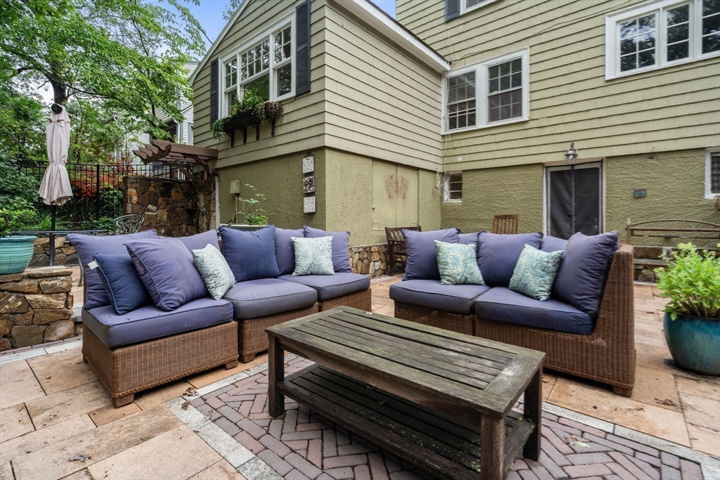 14 Sunset Road Wellesley, MA 02482 - Photo 31 of 39 a outdoor living area with a couch and a stove