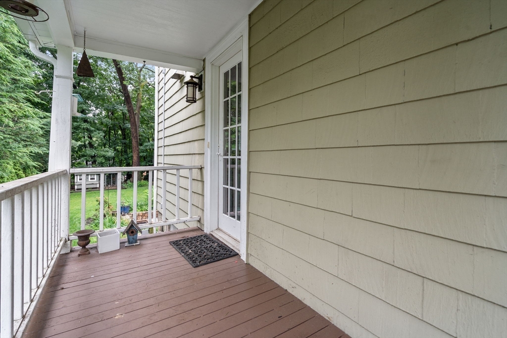 14 Sunset Road Wellesley, MA 02482 - Photo 32 of 39 a view of front door deck and wooden floor
