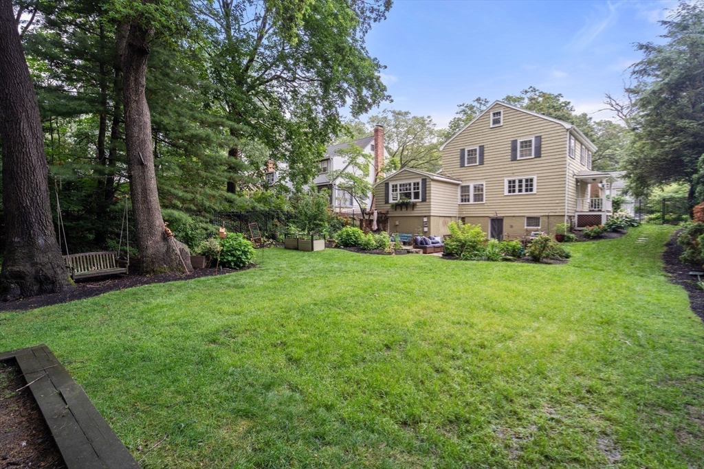 14 Sunset Road Wellesley, MA 02482 - Photo 36 of 39 a front view of a house with garden