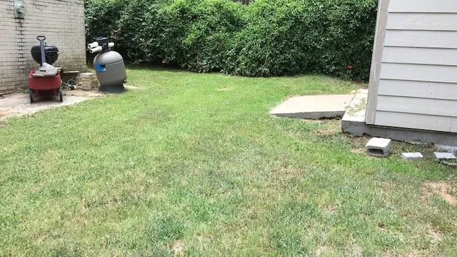 a backyard of a house with seating space