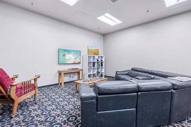 a room with furniture and window