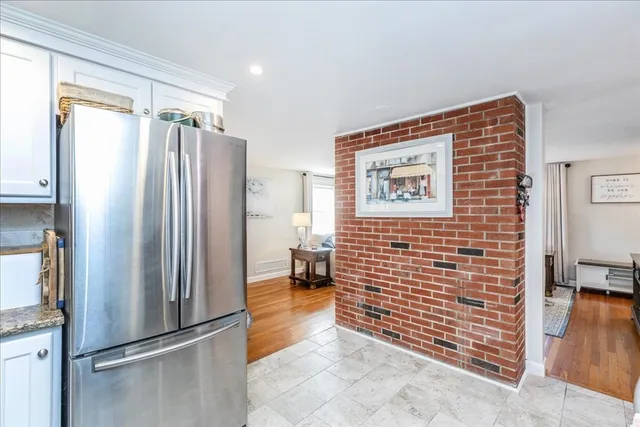 a view of livingroom with furniture and wooden floor