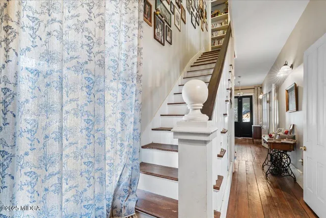 a view of a hallway with workspace