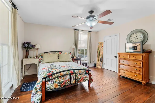a bathroom with a sink toilet tub and shower