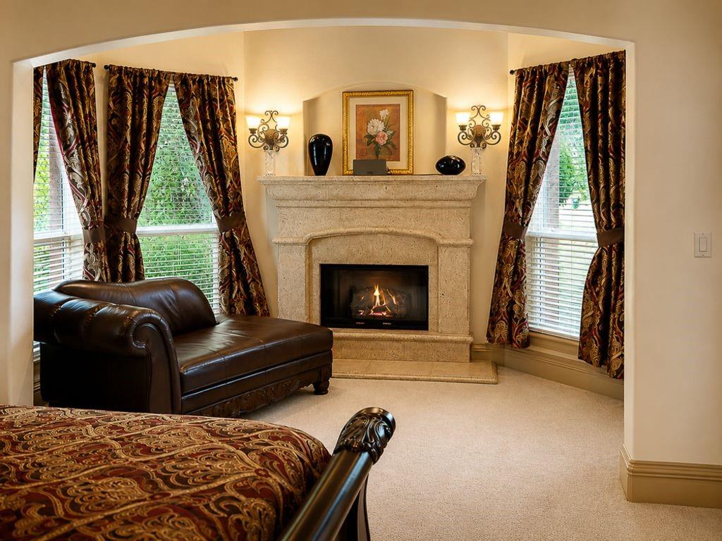 7005 Peter's Path Colleyville, TX 76034 - Photo 23 of 40 a bedroom with a bed and a fireplace