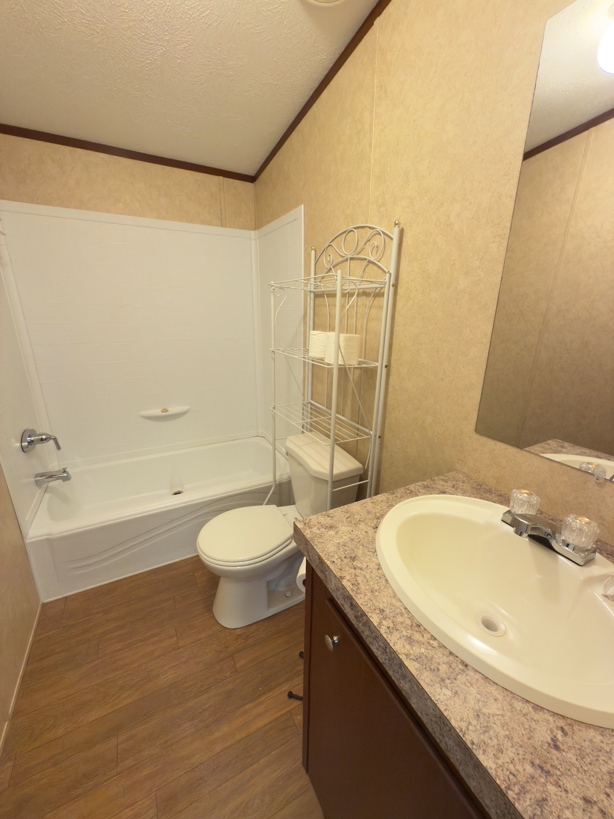 15 Joe Blanton Road Woodbury, TN 37190 - Photo 11 of 15 a bathroom with a granite countertop sink toilet and shower
