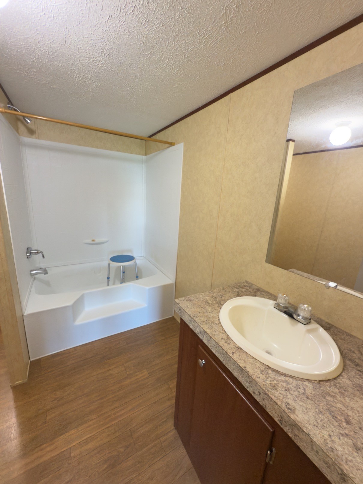 15 Joe Blanton Road Woodbury, TN 37190 - Photo 12 of 15 a bathroom with a granite countertop sink and a mirror