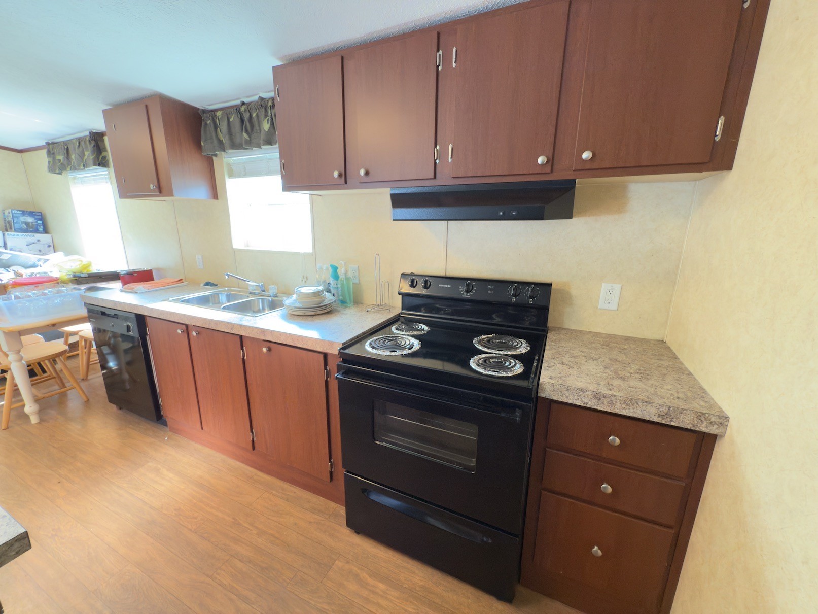 15 Joe Blanton Road Woodbury, TN 37190 - Photo 7 of 15 a kitchen with stainless steel appliances granite countertop a sink stove and cabinets