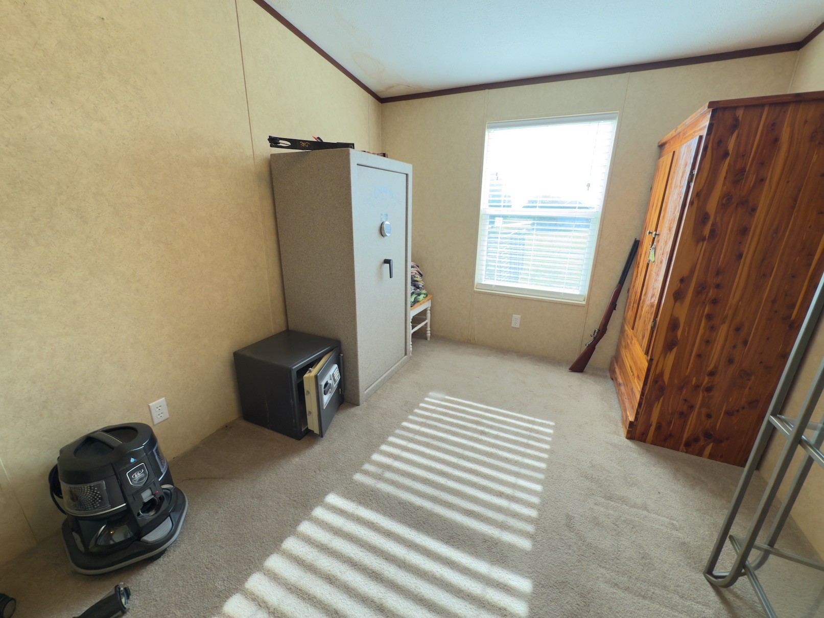 15 Joe Blanton Road Woodbury, TN 37190 - Photo 9 of 15 a view of a closet area with furniture and windows