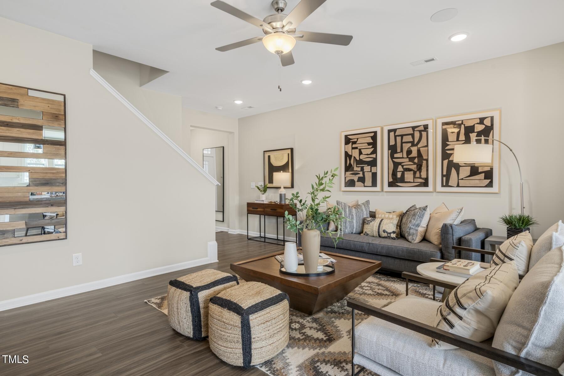 164 Siebold Street Garner, NC 27529 - Photo 22 of 70 a living room with furniture and wooden floor
