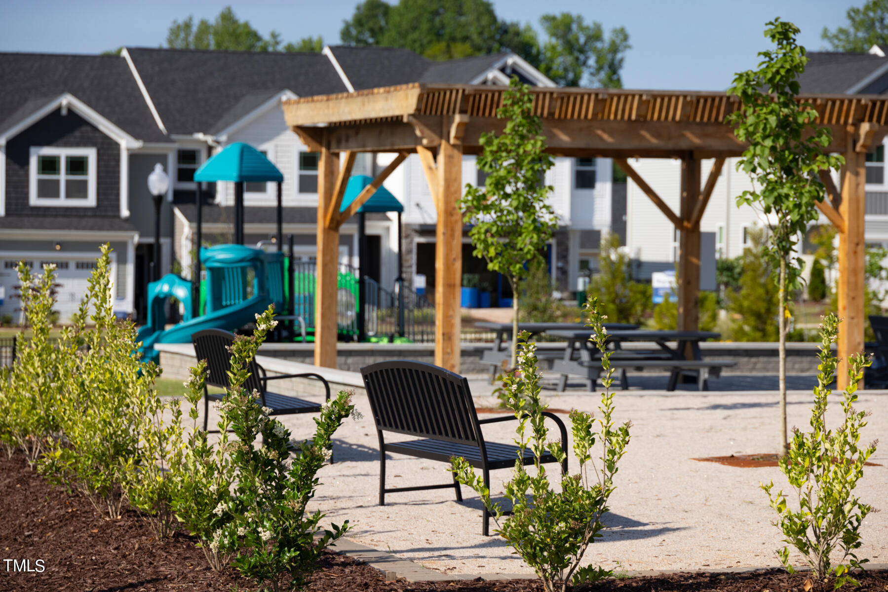 164 Siebold Street Garner, NC 27529 - Photo 43 of 70 a view of a patio with couches table and chairs and potted plants