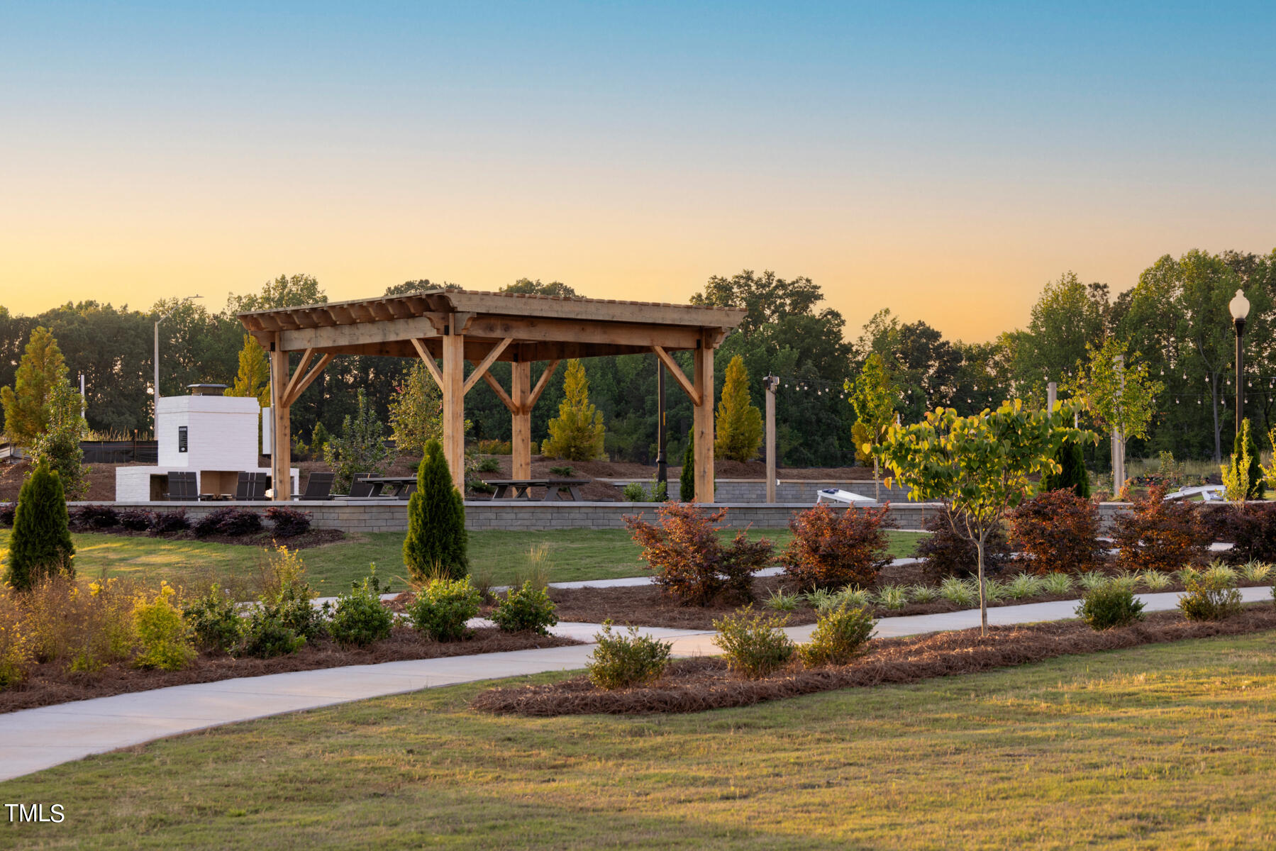 164 Siebold Street Garner, NC 27529 - Photo 46 of 70 a view of a house with swimming pool and sitting area