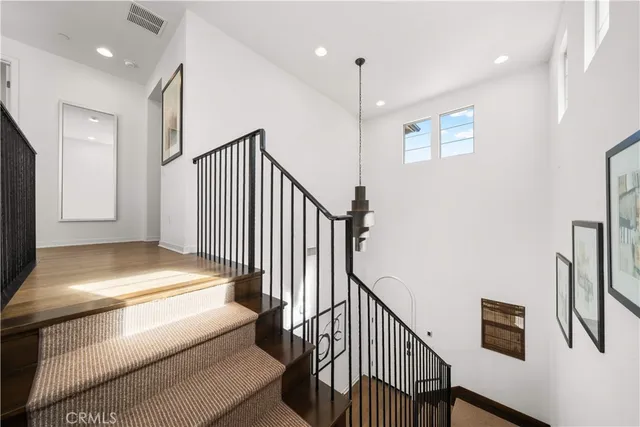 a view of a balcony with wooden floor