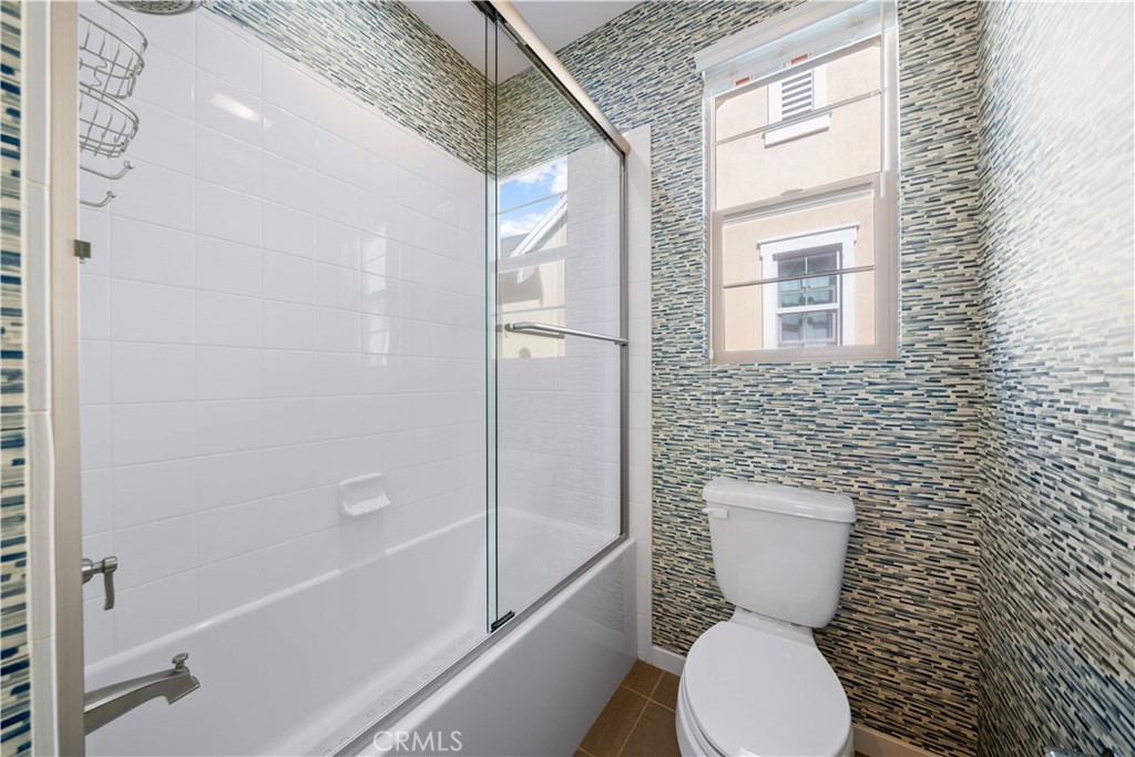 105 Newall Irvine, CA 92618 - Photo 39 of 59 a bathroom with a toilet and a shower