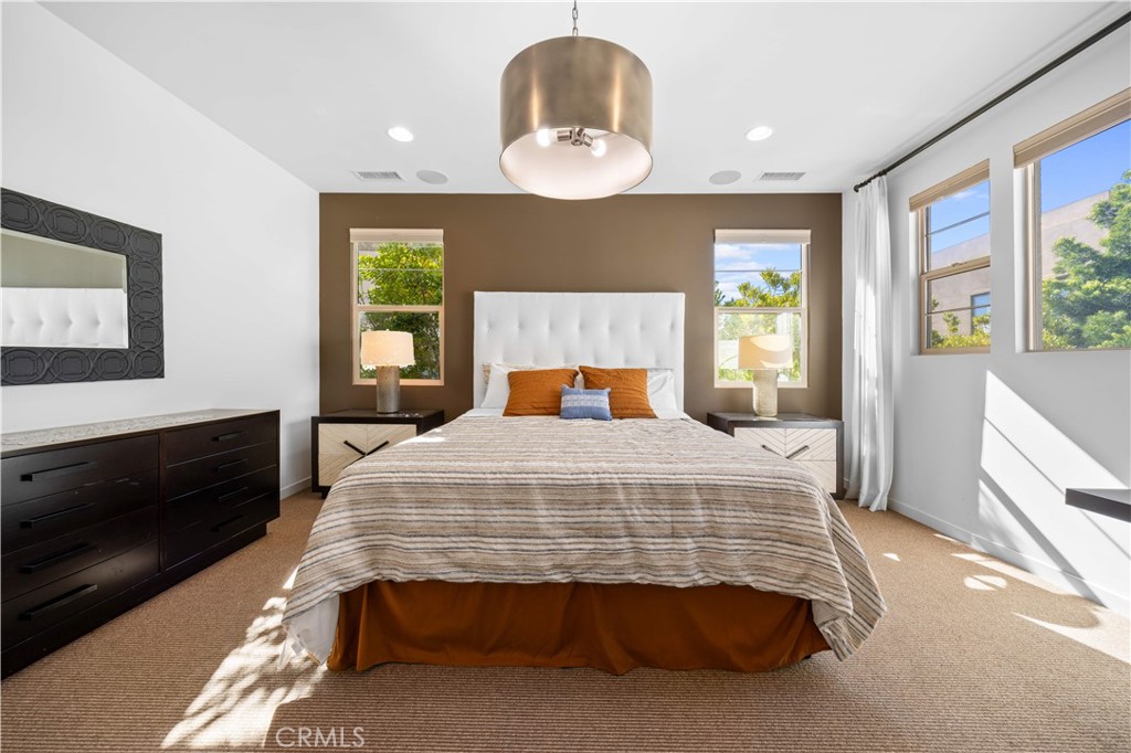 105 Newall Irvine, CA 92618 - Photo 46 of 59 a bedroom with a bed and window