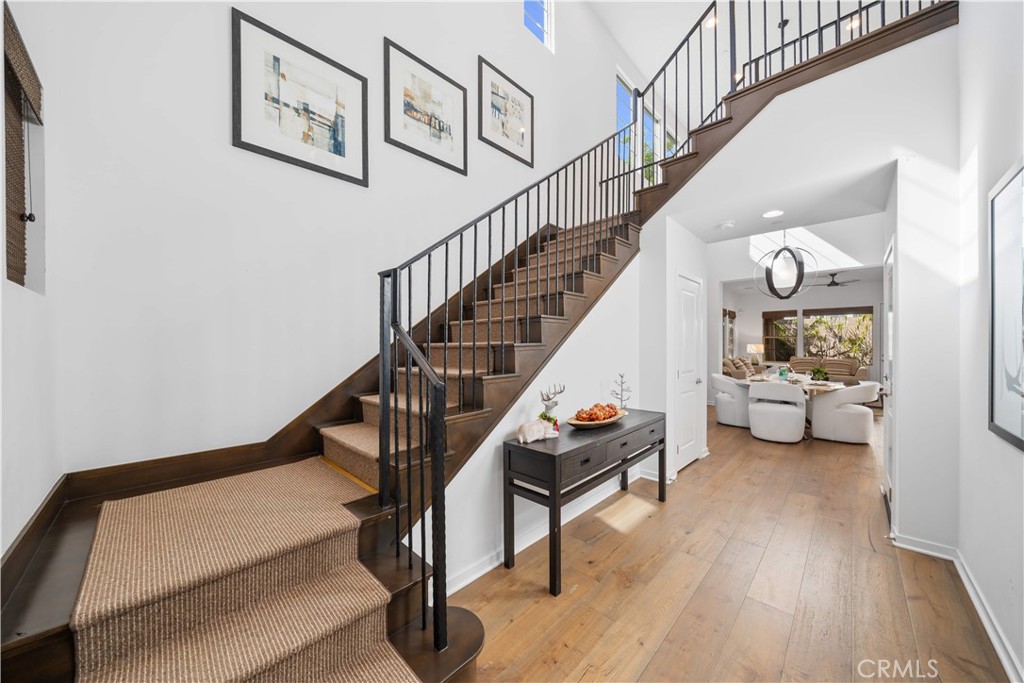 105 Newall Irvine, CA 92618 - Photo 5 of 59 a view of entryway and hall with wooden floor