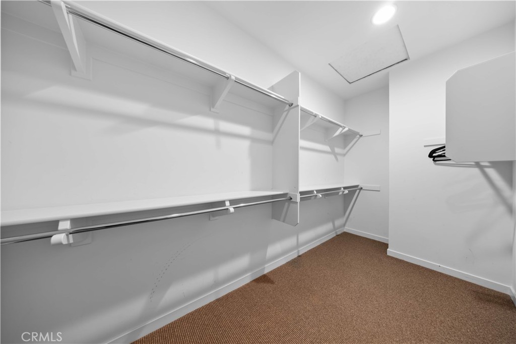 105 Newall Irvine, CA 92618 - Photo 51 of 59 a view of a room with racks on the wall