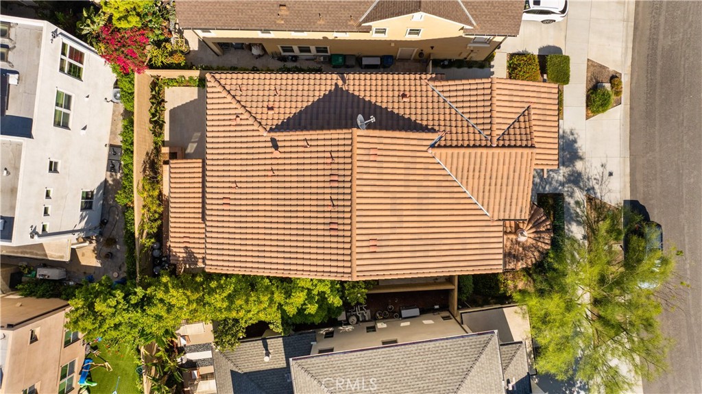 105 Newall Irvine, CA 92618 - Photo 55 of 59 a front view of a house with a yard