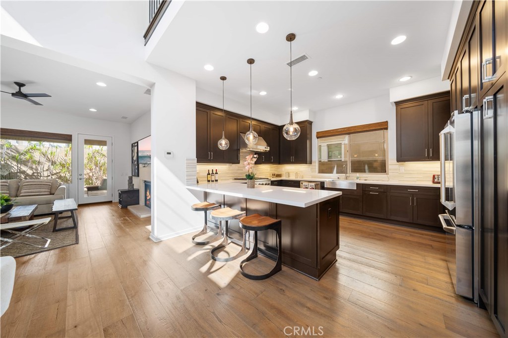 105 Newall Irvine, CA 92618 - Photo 9 of 59 a large kitchen with cabinets table and chairs