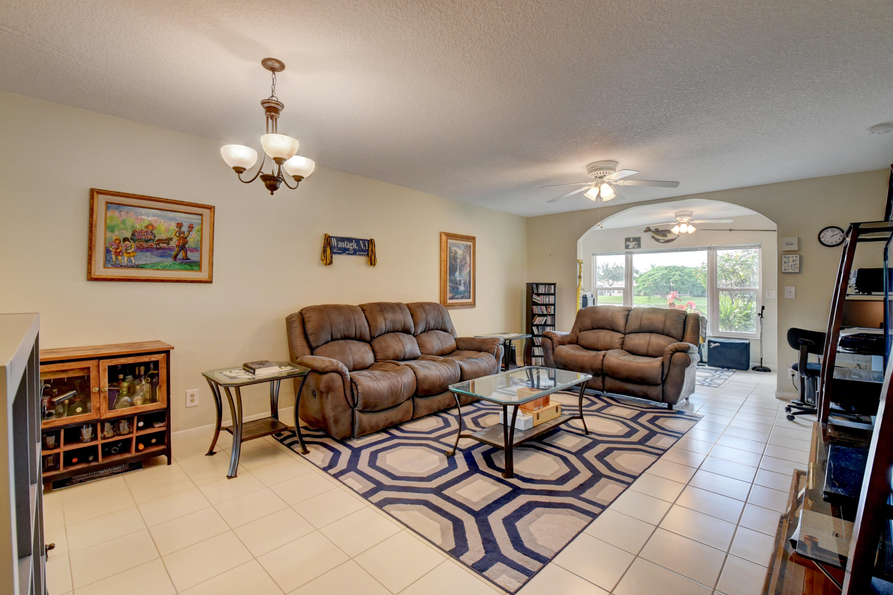 9094 Flynn Circle, Unit 1 Boca Raton, FL 33496 - Photo 11 of 23 Tiled Living Room