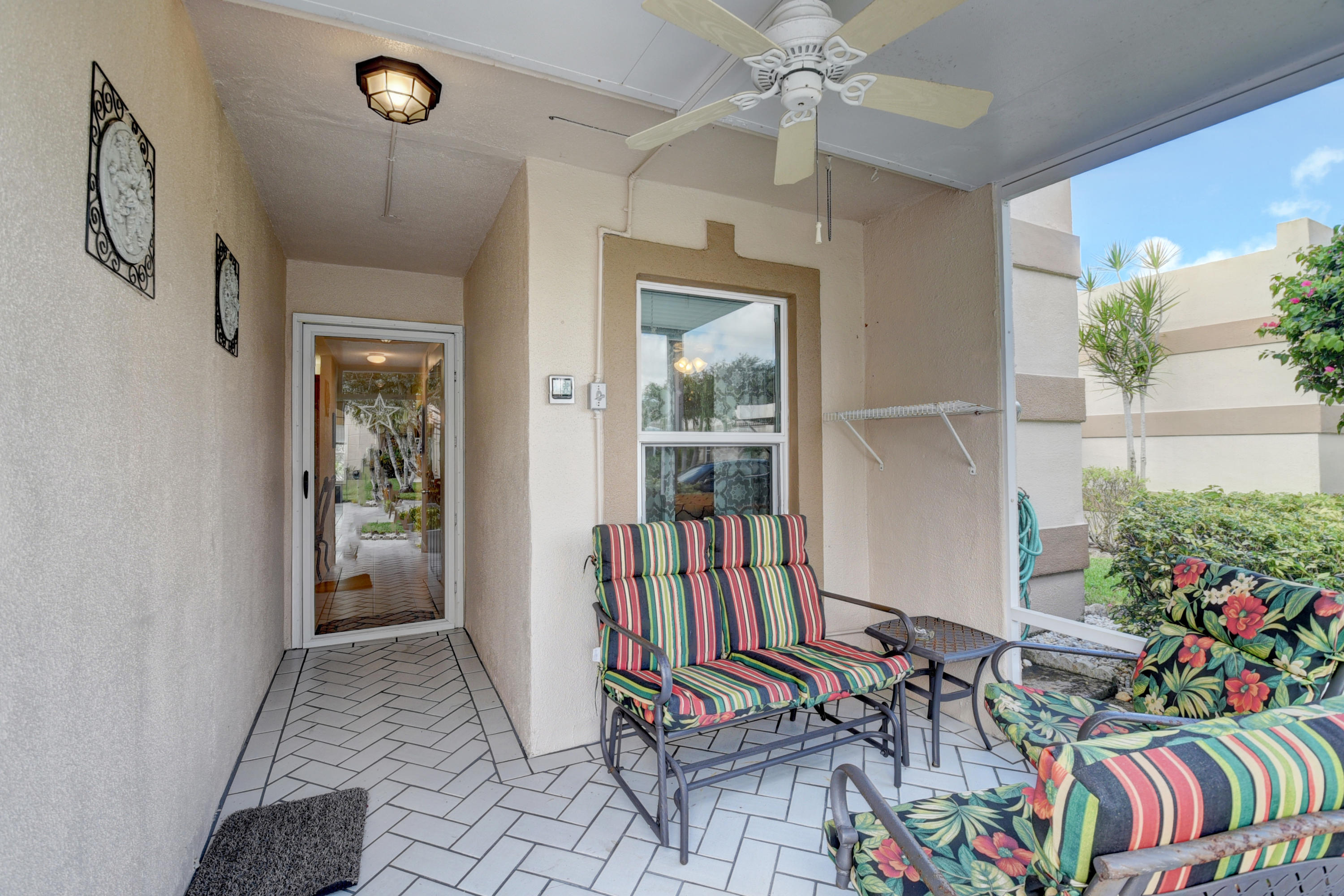 9094 Flynn Circle, Unit 1 Boca Raton, FL 33496 - Photo 5 of 23 Screened Porch
