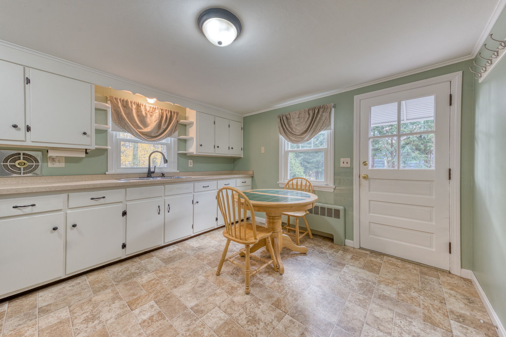 3 Avon St Extension Enfield, CT 06082 - Photo 9 of 16 a spacious bathroom with a sink and a mirror