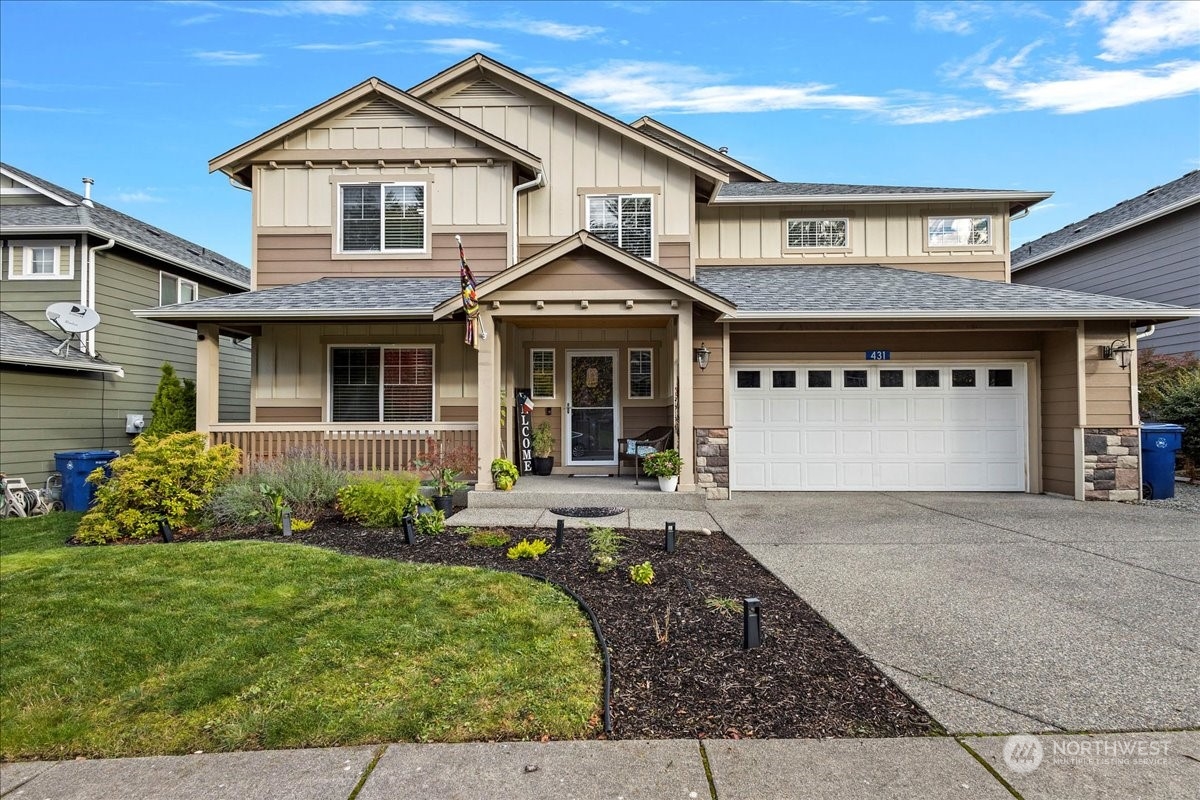 431 Barry Loop Mount Vernon, WA 98274 - Photo 1 of 32 a front view of a house with garden