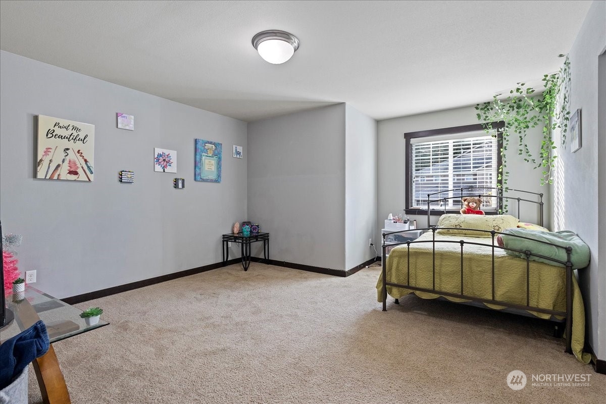 431 Barry Loop Mount Vernon, WA 98274 - Photo 21 of 32 a bedroom with bed and window