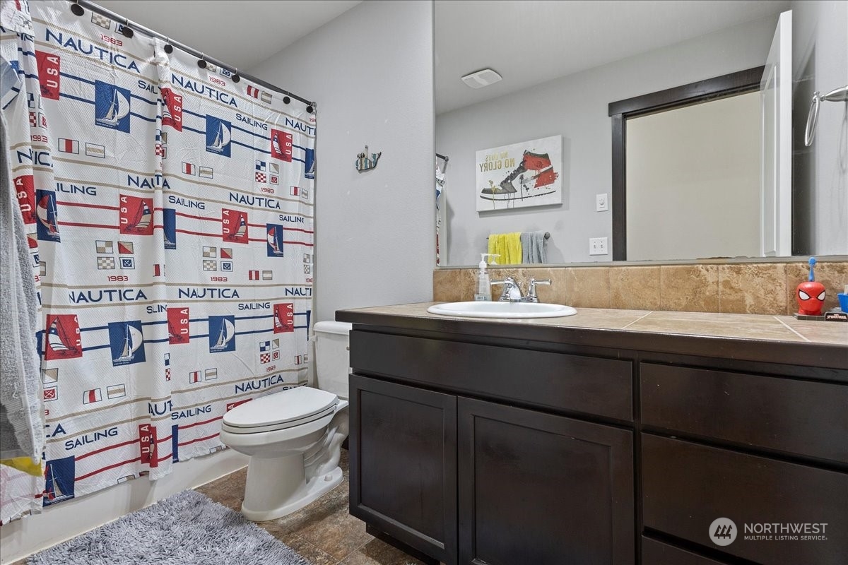 431 Barry Loop Mount Vernon, WA 98274 - Photo 22 of 32 a bathroom with a sink and a toilet