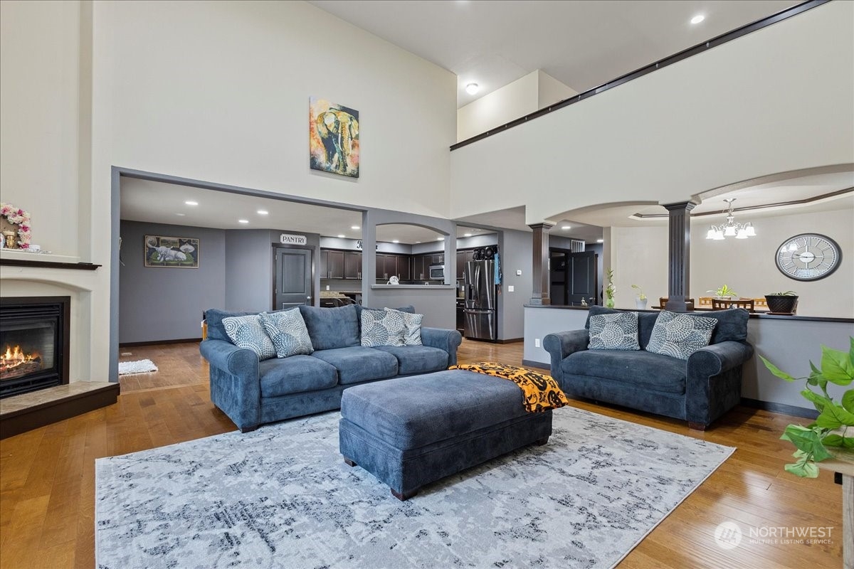 431 Barry Loop Mount Vernon, WA 98274 - Photo 7 of 32 a living room with furniture and a fireplace