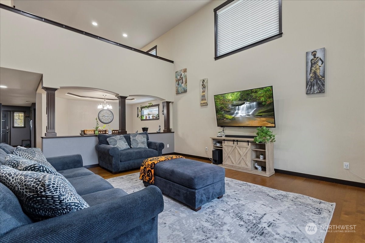 431 Barry Loop Mount Vernon, WA 98274 - Photo 9 of 32 a living room with furniture and a flat screen tv