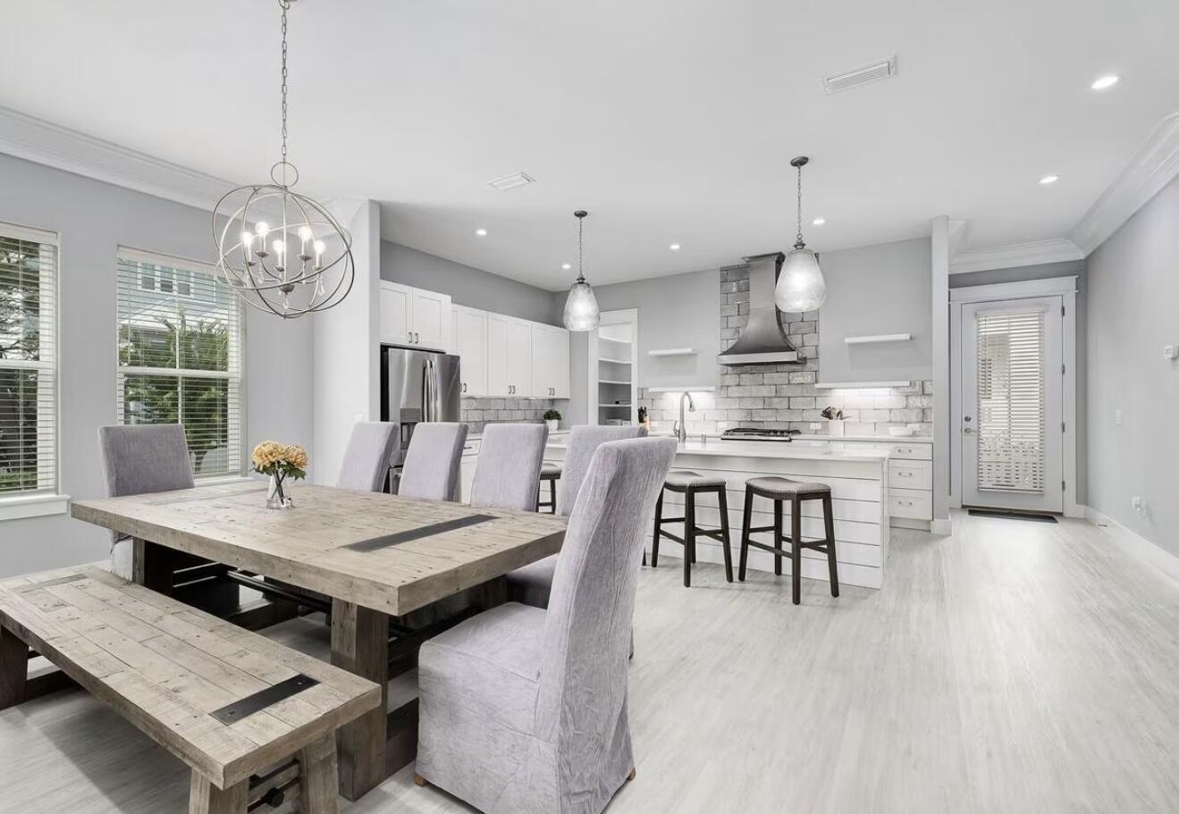 37 Grande Pointe Drive Inlet Beach, FL 32461 - Photo 14 of 58 a room with stainless steel appliances kitchen island a table and chairs in it