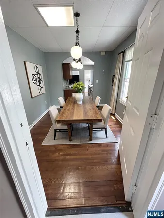 a view of a living room and dining room