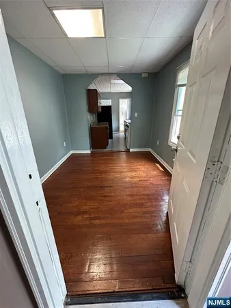 a view of livingroom with furniture and staircase