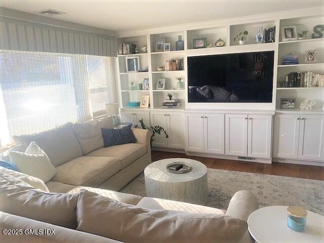 8 Perry Place Riverside, CT 06878 - Photo 3 of 26 a living room with furniture and a flat screen tv