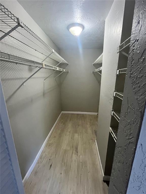 1805 Lennox Road East, Unit 1805 Palm Harbor, FL 34683 - Photo 12 of 15 a view of a room with racks on the wall