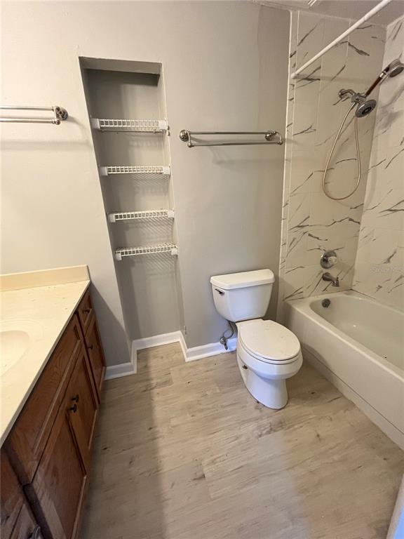 1805 Lennox Road East, Unit 1805 Palm Harbor, FL 34683 - Photo 8 of 15 a bathroom with a toilet and a bathtub