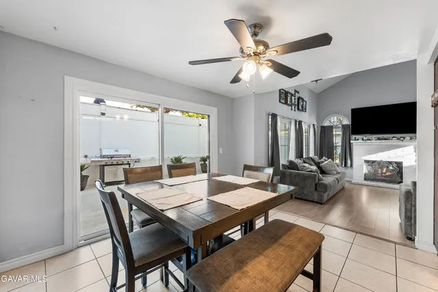 a view of a livingroom with furniture and a flat screen tv