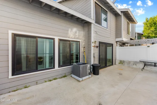 a view of a house with a sitting area