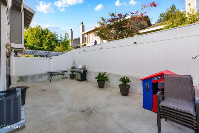 a view of path along with potted plants