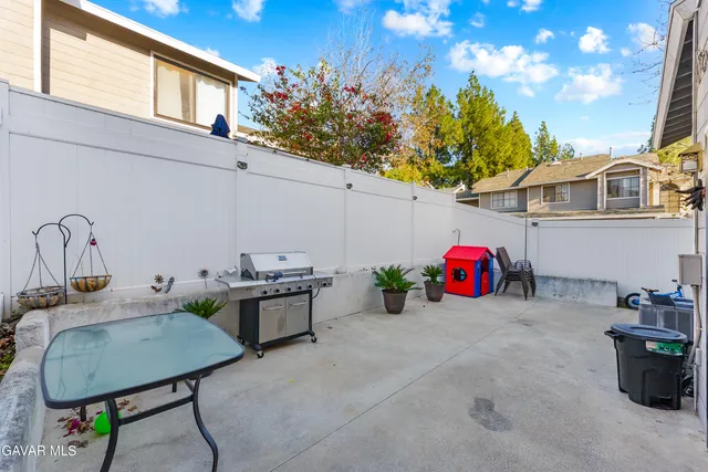 a view of a chairs and table in the house