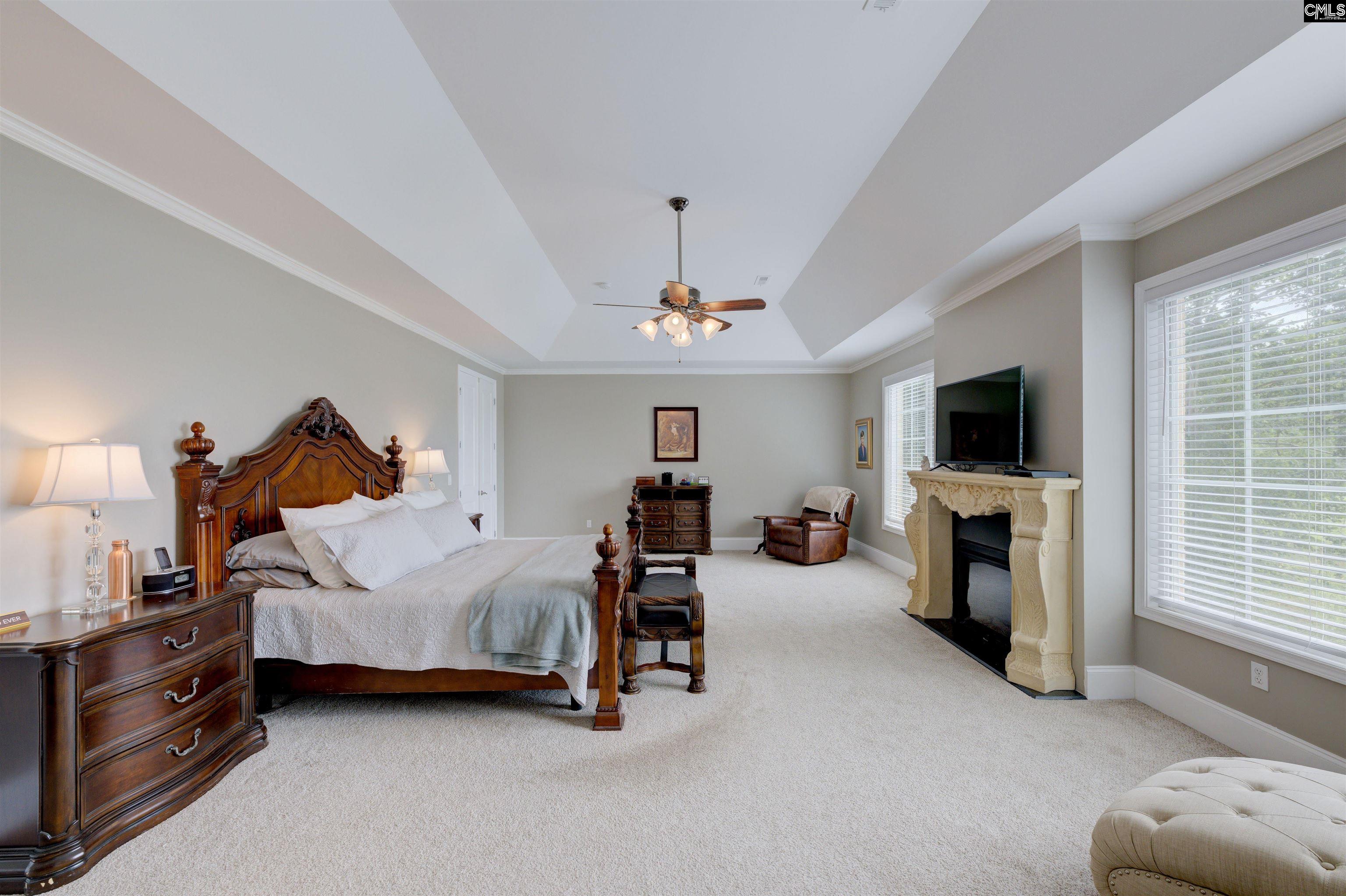 305 Northlake Road Columbia, SC 29223 - Photo 29 of 46 a bed room with furniture and a flat screen tv