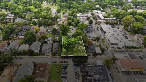 an aerial view of residential house with outdoor space