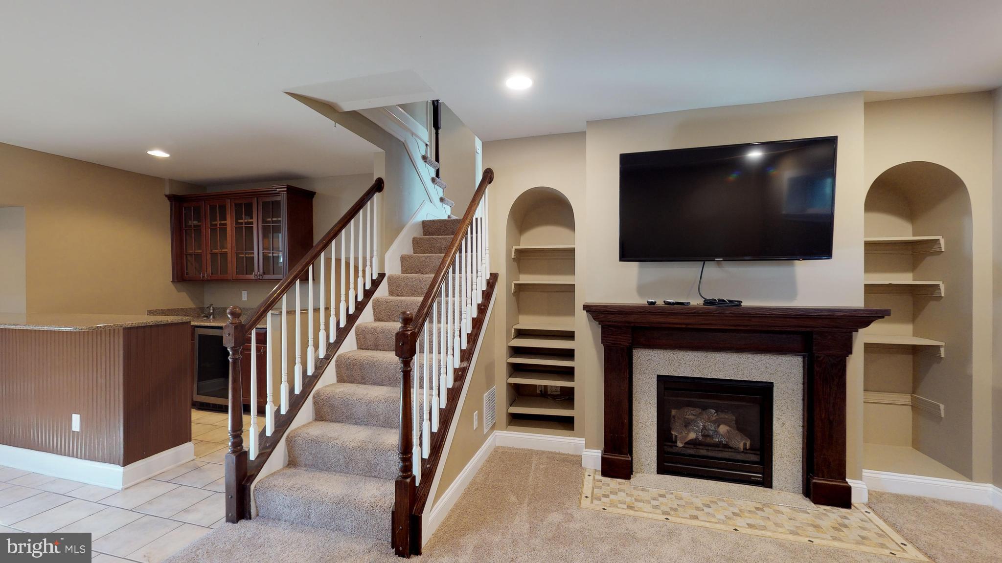 545 Brook Road Towson, MD 21286 - Photo 24 of 30 Wet Bar and Gas FP on Lower Level 1