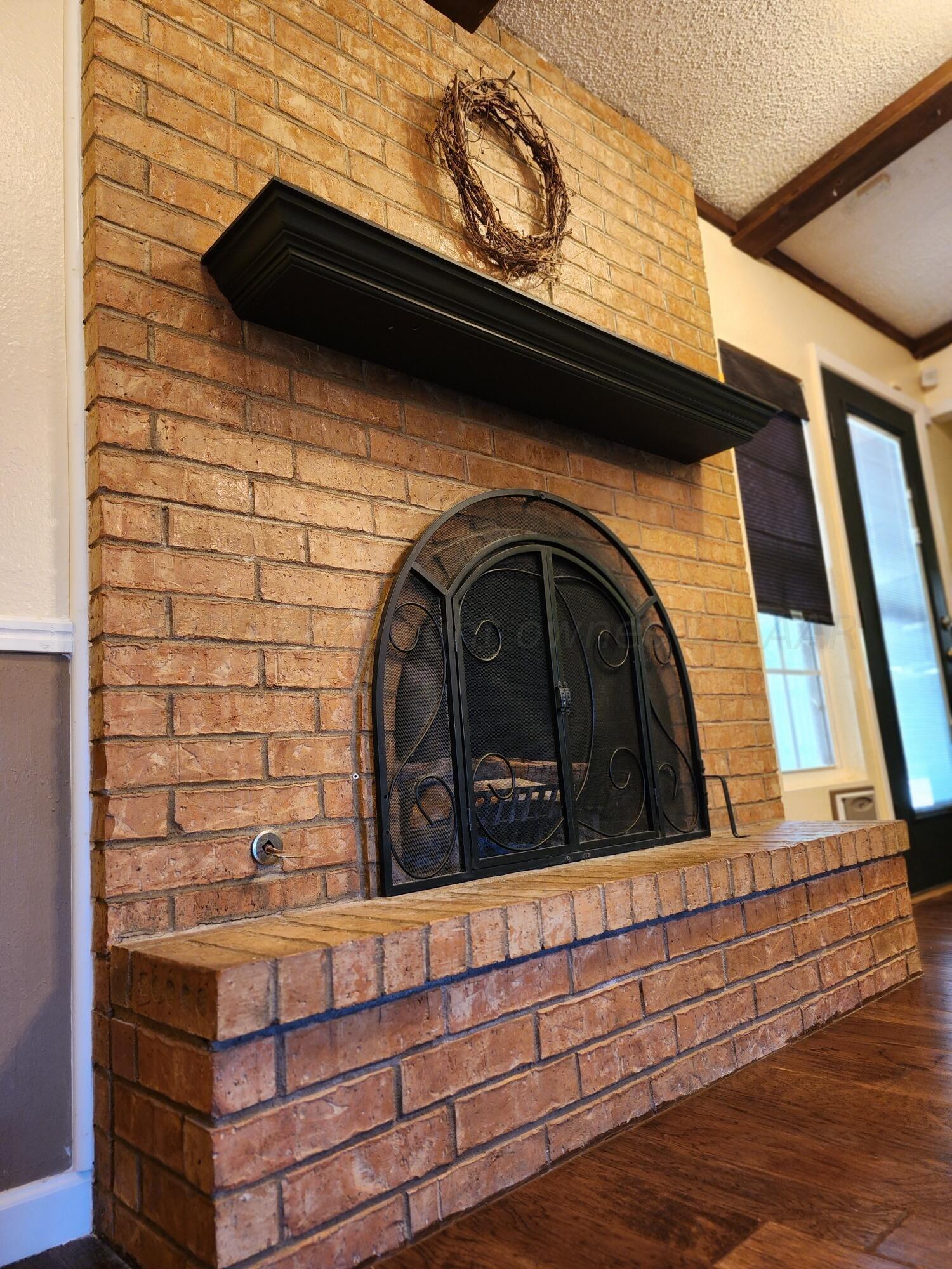 6523 Garwood Road Amarillo, TX 79109 - Photo 7 of 30 fireplace