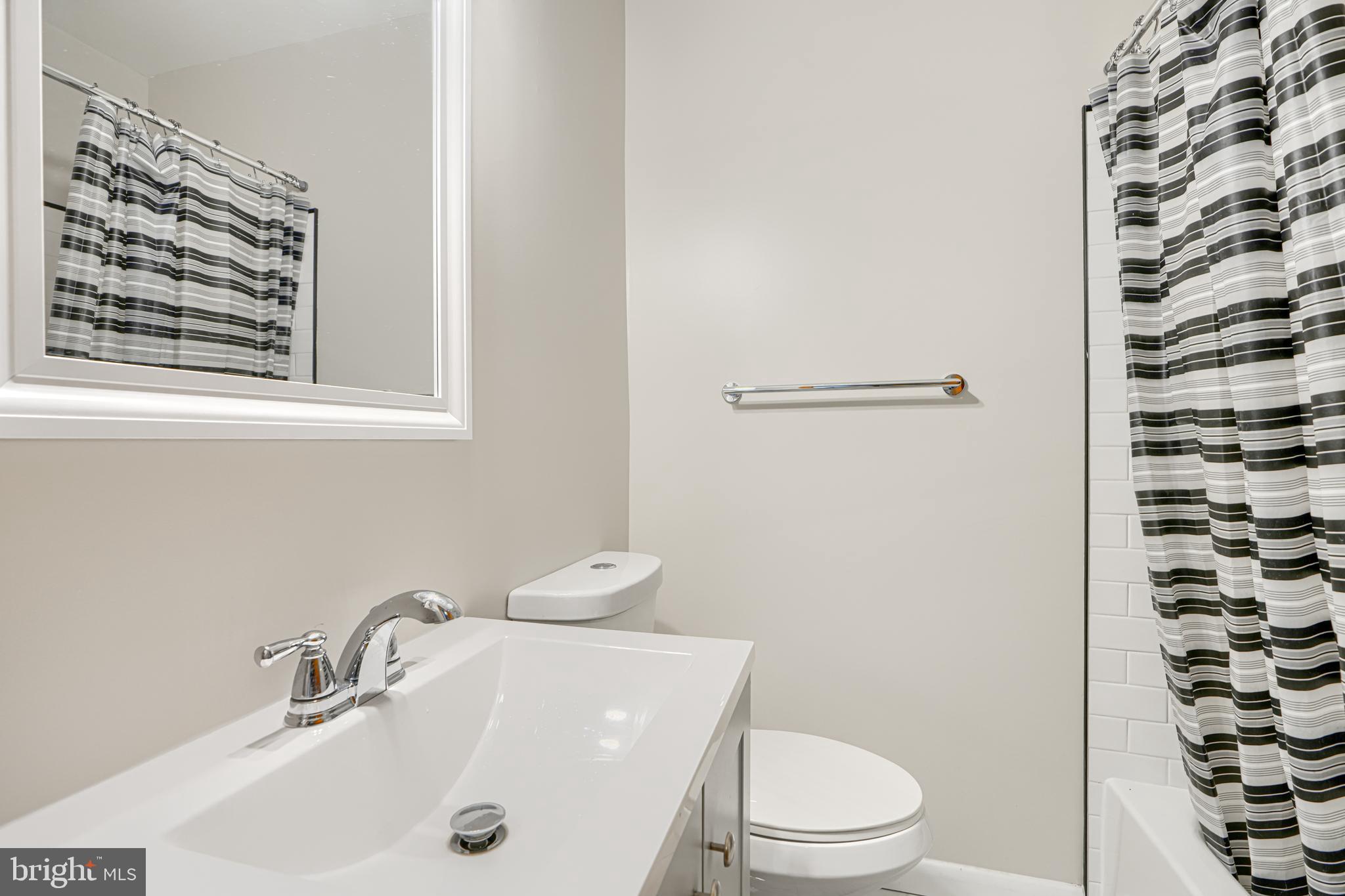 6905 Bank Street Baltimore, MD 21224 - Photo 11 of 17 Updated bathroom