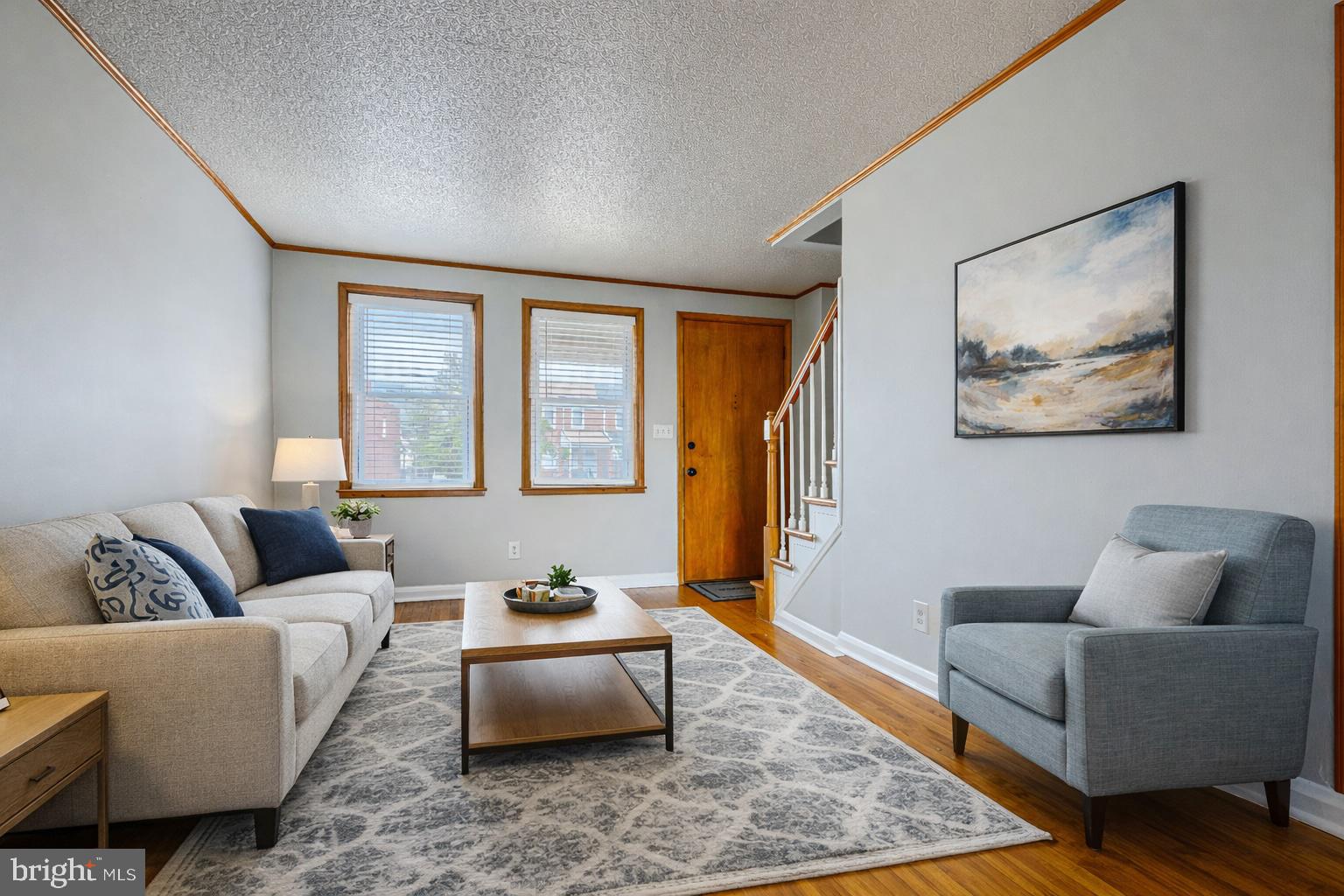 6905 Bank Street Baltimore, MD 21224 - Photo 2 of 17 Living room w/ hardwood floors
